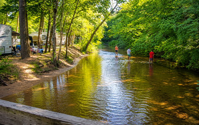May Camping Along the White River Families enjoying the White River at White River RV Park & Campground in West Michigan