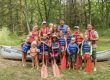 Families preparing for a canoe trip with Happy Mohawk Canoe Livery near White River RV Park & Campground in West Michigan