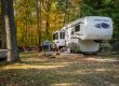 RV campsite surrounded by colorful fall foliage at White River RV Park & Campground before winter storage season